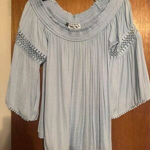 Jennifer Lopez Light Blue Off-Shoulder Blouse